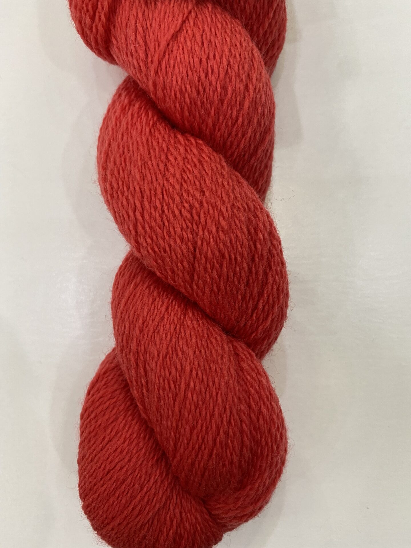 A big bunch of wool in dark red color