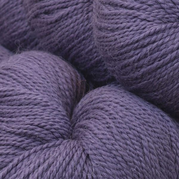 Close up image of soft wool in purple color