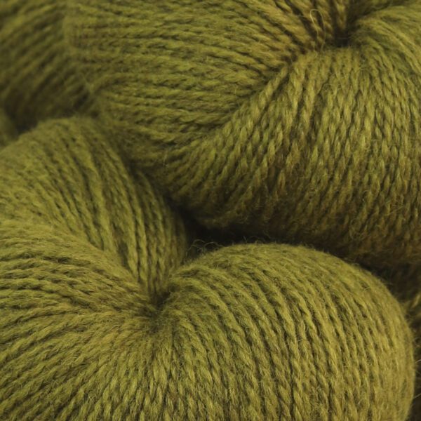 Close up image of soft wool in green color