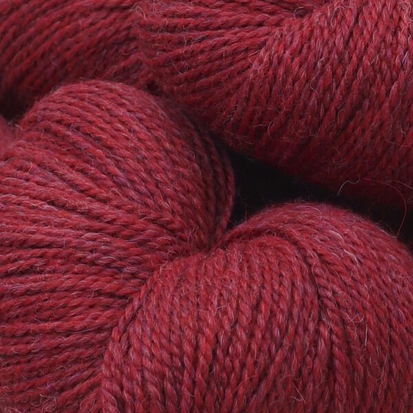 Close up image of soft wool in red color