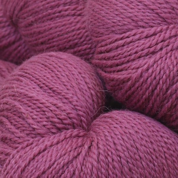 Close up image of soft wool in pink color