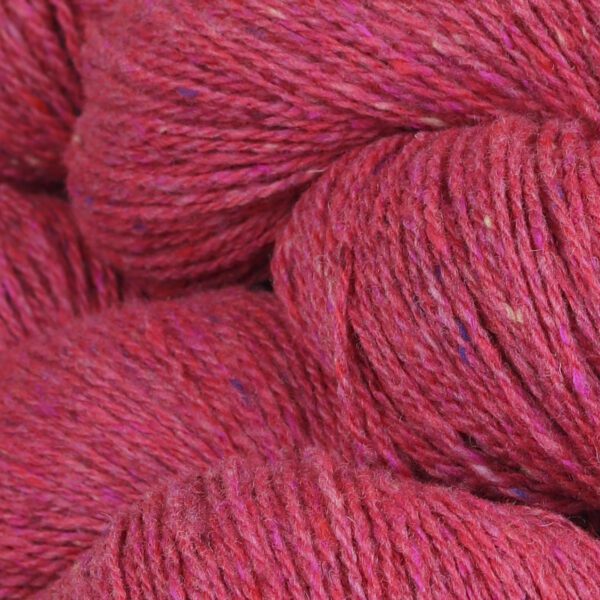 Close up shot of wool in pink color
