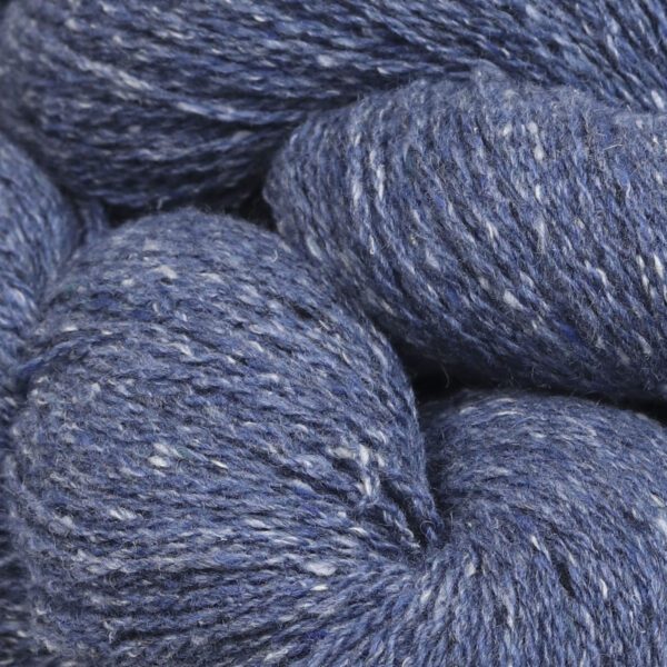 Close up shot of wool in navy blue color