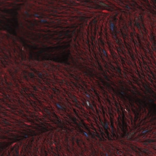 Close up shot of wool in bloodred color