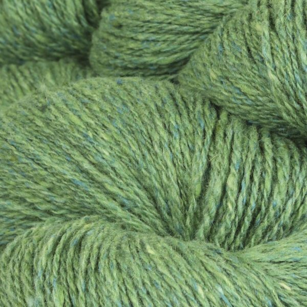 Close up shot of a bunch of wool in green color