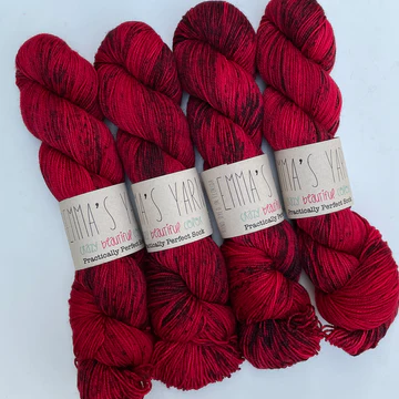 Four bunch of wool in dark red color