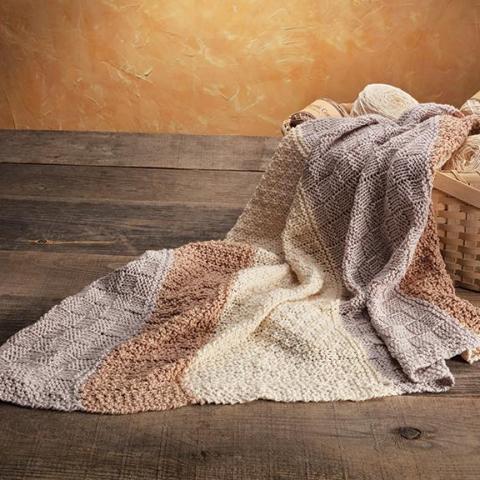 Appalachian Baby Pick a Knit Blanket Kit on floor