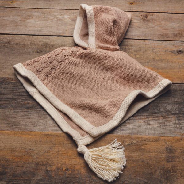 Appalachian Baby Doe Poncho Kit cloth on table